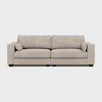 Large beige fabric sofa with square arms and two cushions on a plain background