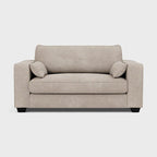 Beige love seat sofa with square arms and two side cushions on a white background