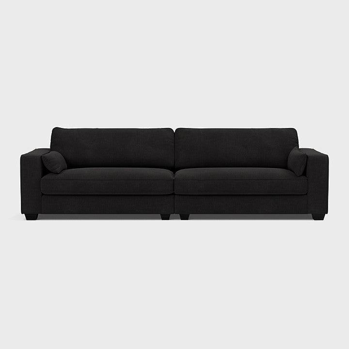 Modern black XL fabric sofa with square arms and cushions on a white background