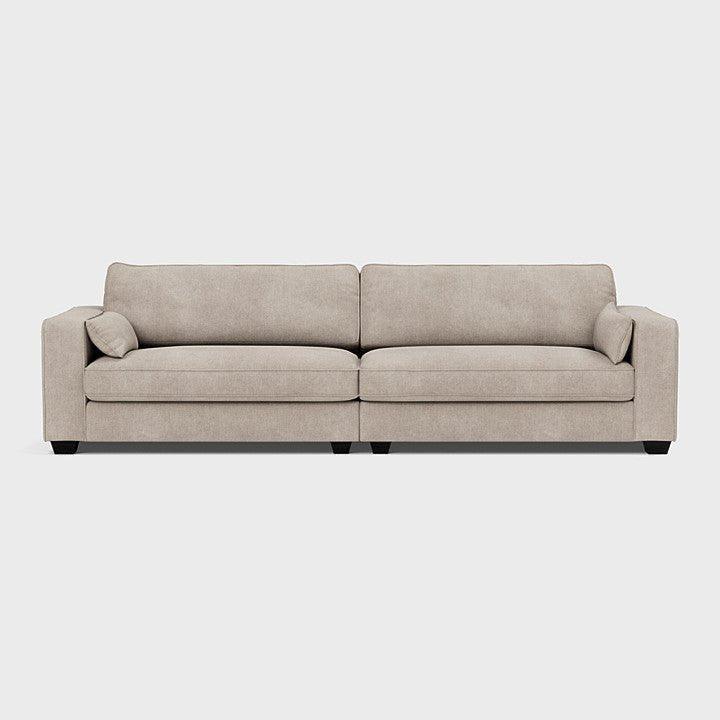 Modern beige XL sofa with clean lines, plush cushions, and low-profile arms on white background