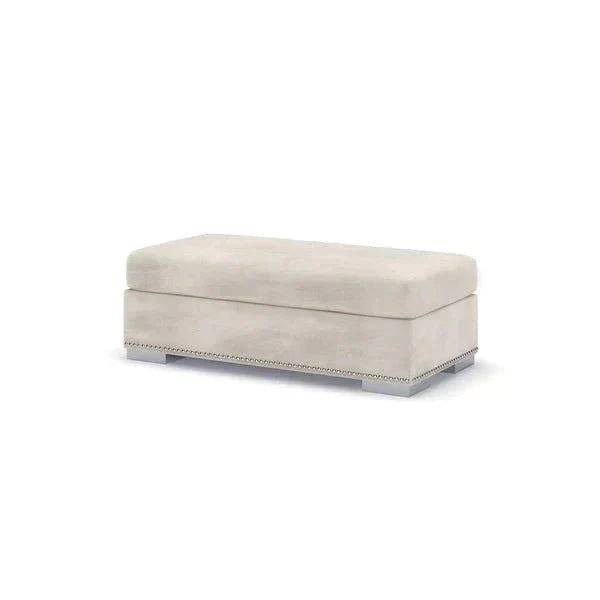 Modern light grey rectangular footstool with metal stud detail and low legs