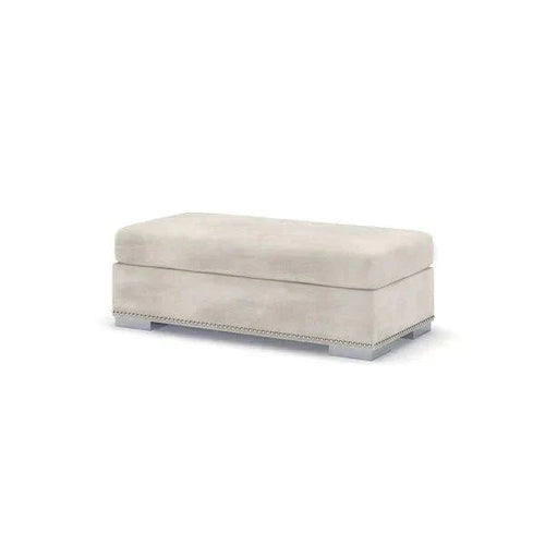 Modern light grey rectangular footstool with metal stud detail and low legs
