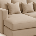 Plush cream velvet right-hand sectional sofa with large cushions and modern design
