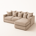 Large right hand velvet corner sofa in plush cream with scatter cushions