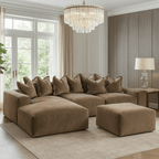 Large left-hand facing mink velvet pillow back sofa with matching ottoman in modern living room