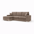 Mink left hand facing corner sofa with studded trim and plush cushions on white background