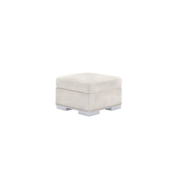 Square silver velvet footstool with studded trim and block feet on white background