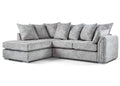 Modern grey corner sofa with chaise lounge and plush cushions on white background