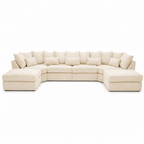 Large U-shaped beige sectional sofa with plush cushions and chaise ends