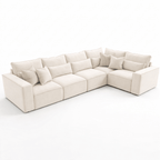 White modular corner sofa with plush cushions and pillows, five-piece sectional design