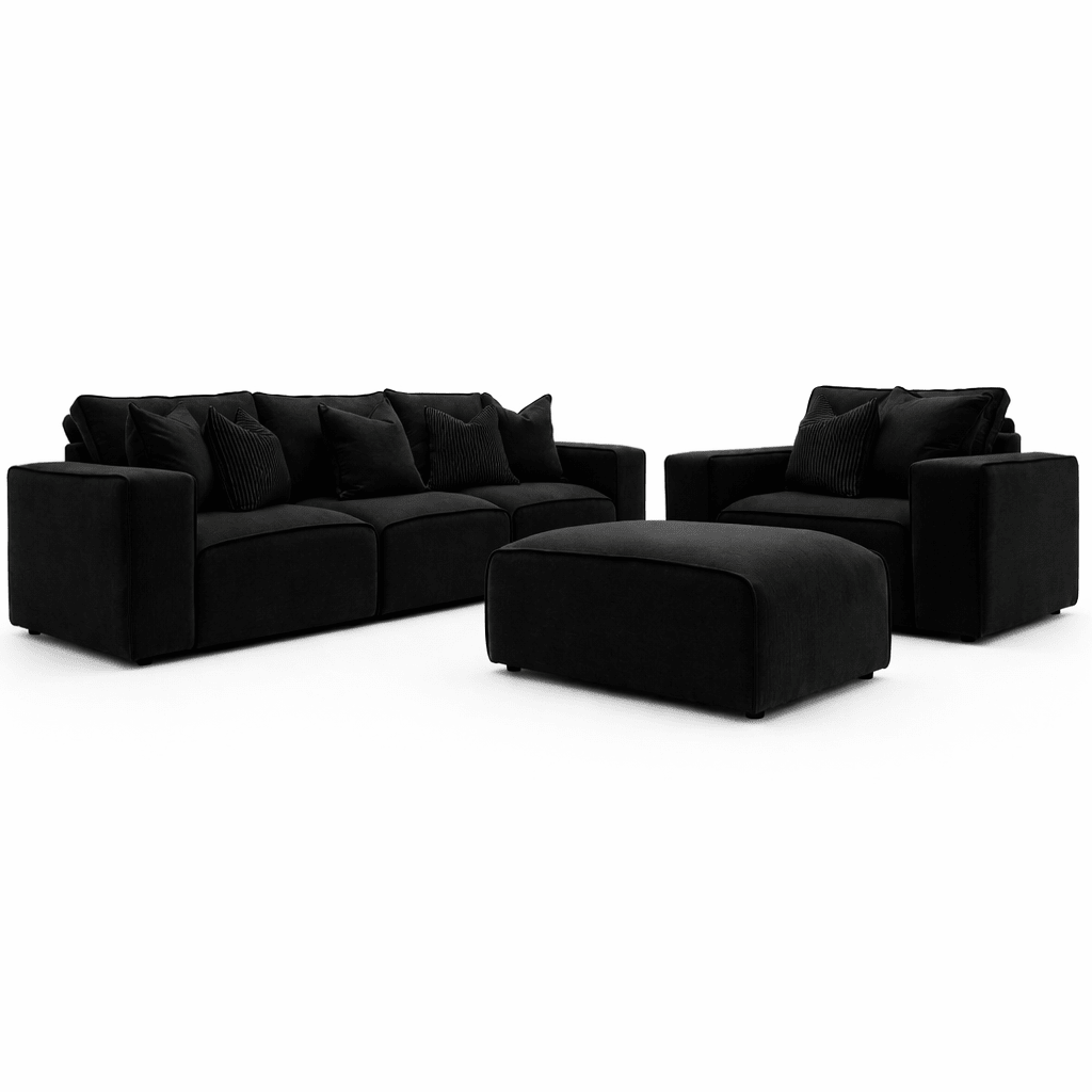 Modern black velvet sofa set with three-seater, armchair, and matching footstool