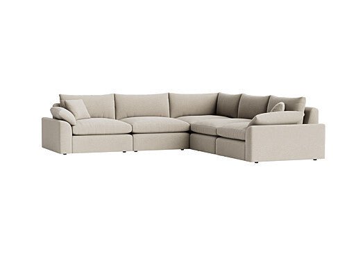 Beige modular corner sofa with plush cushions and chaise design on white background