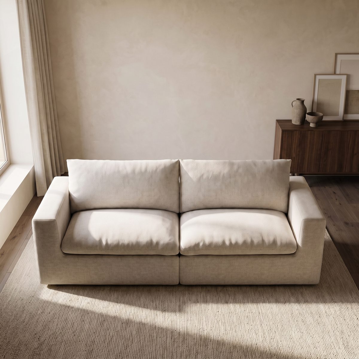 Nuvola 3-Seater Premium Feather-Filled Sofa — elevated camera view in a warm stone and walnut living room