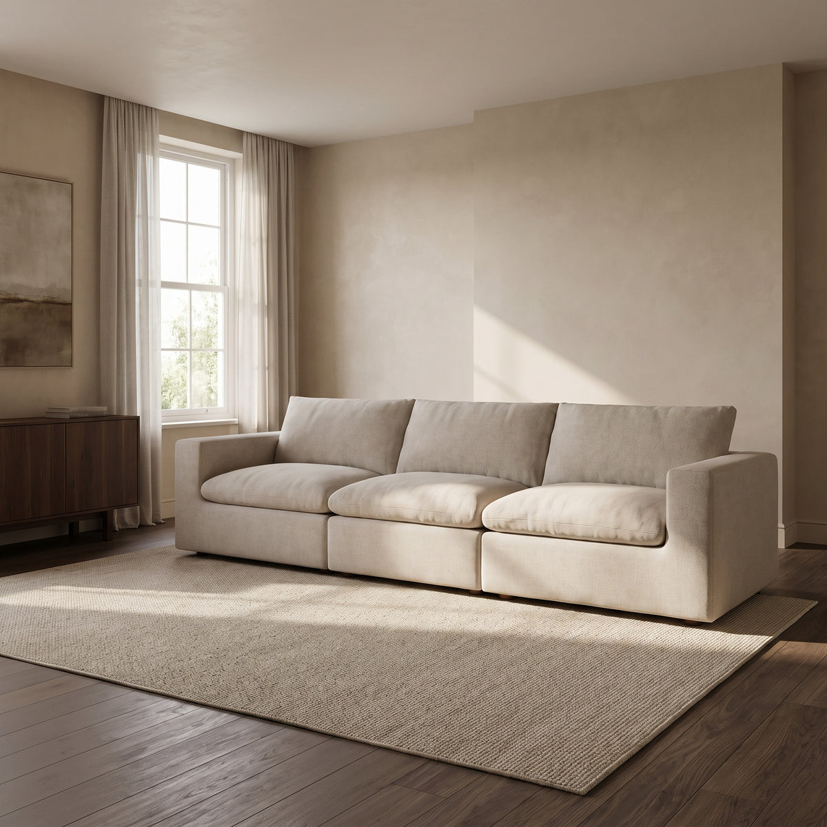 Nuvola Extended Modular Feather-Filled Sofa — main lifestyle view in a warm stone and walnut living room
