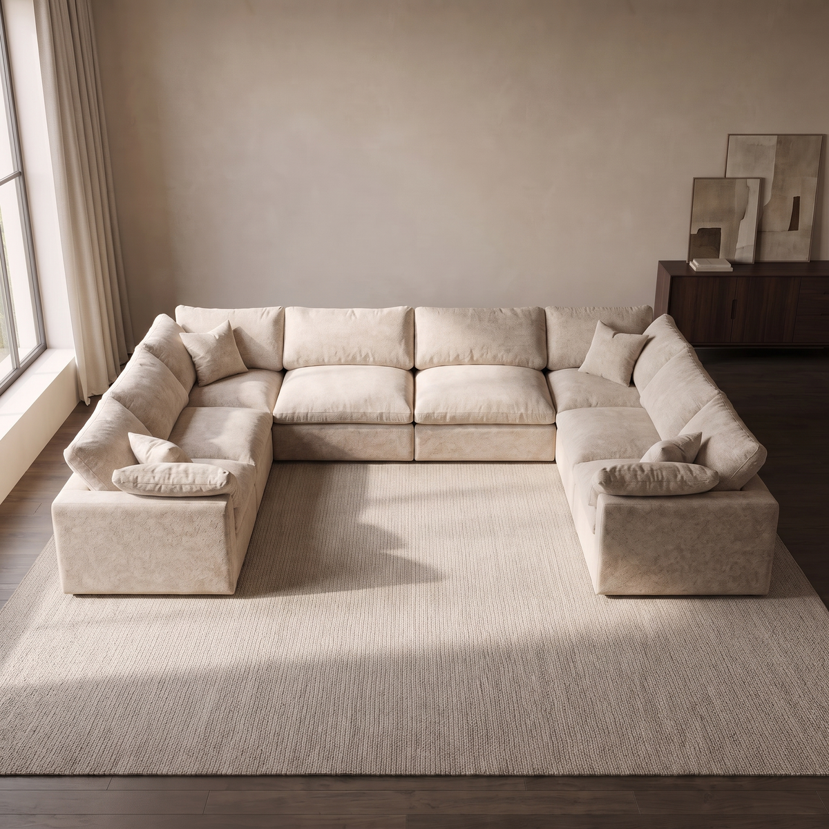 Nuvola Feather-Filled U-Shape Sectional Sofa — elevated camera view in a warm stone and walnut living room