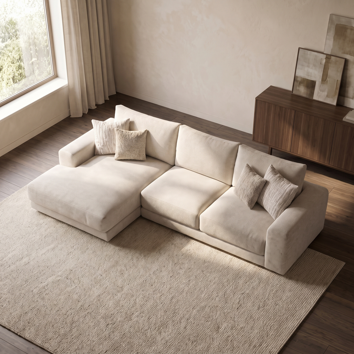 Portofino 3 Seater With Left Hand Facing Chaise Sofa — elevated camera view in a warm stone and walnut living room