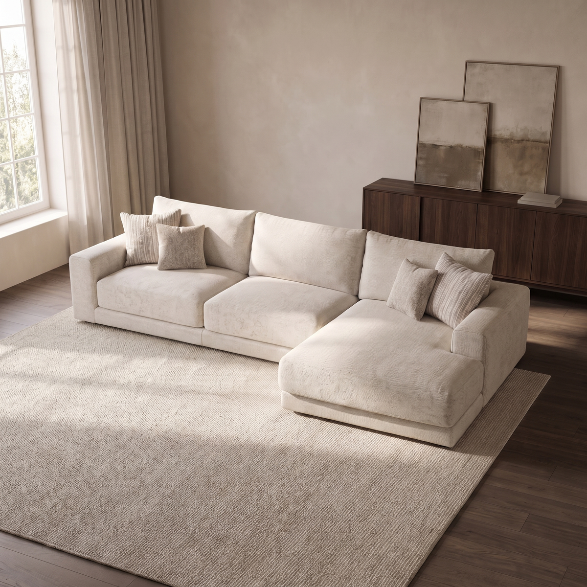 Portofino 4 Seater Chaise Sofa — elevated camera view in a warm stone and walnut living room