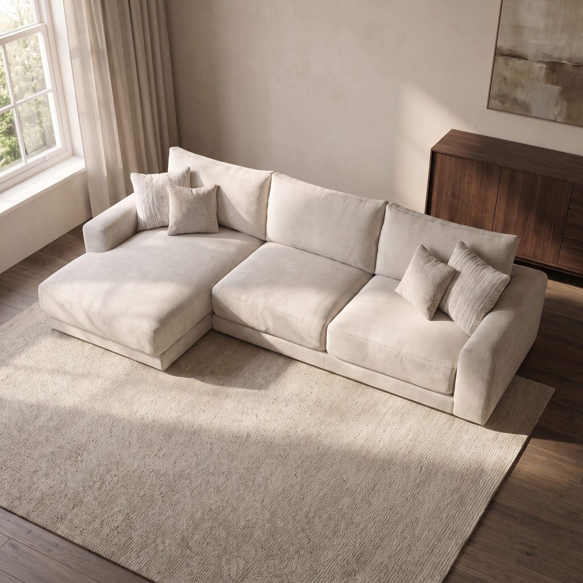 Portofino Chaise 4 Seater Sofa — elevated camera view in a warm stone and walnut living room