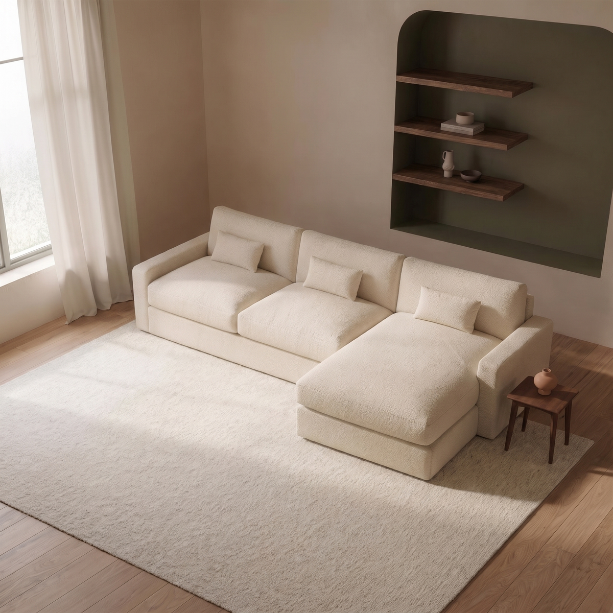Raffaelo Corner Sofa - Fibre-Topped Sink-In Seats — elevated camera view in its styled living room with olive shelving