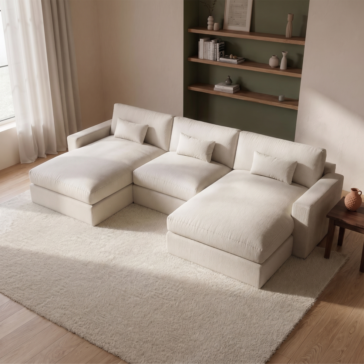 Raffaelo Large U-Shape Sofa — elevated camera view in its styled living room with olive shelving