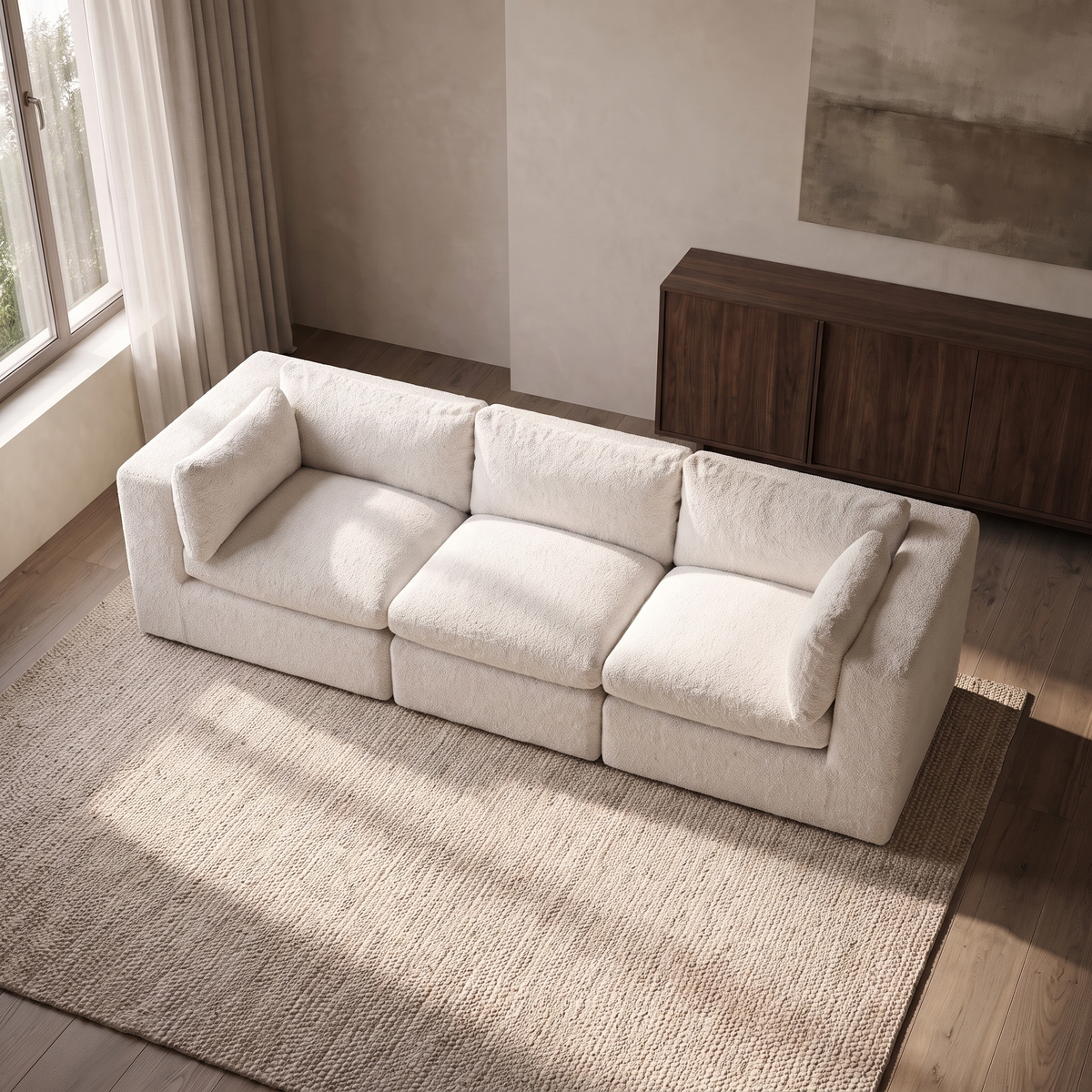 Selene 3-Seater Modular Sofa — elevated camera view in a warm stone and walnut living room