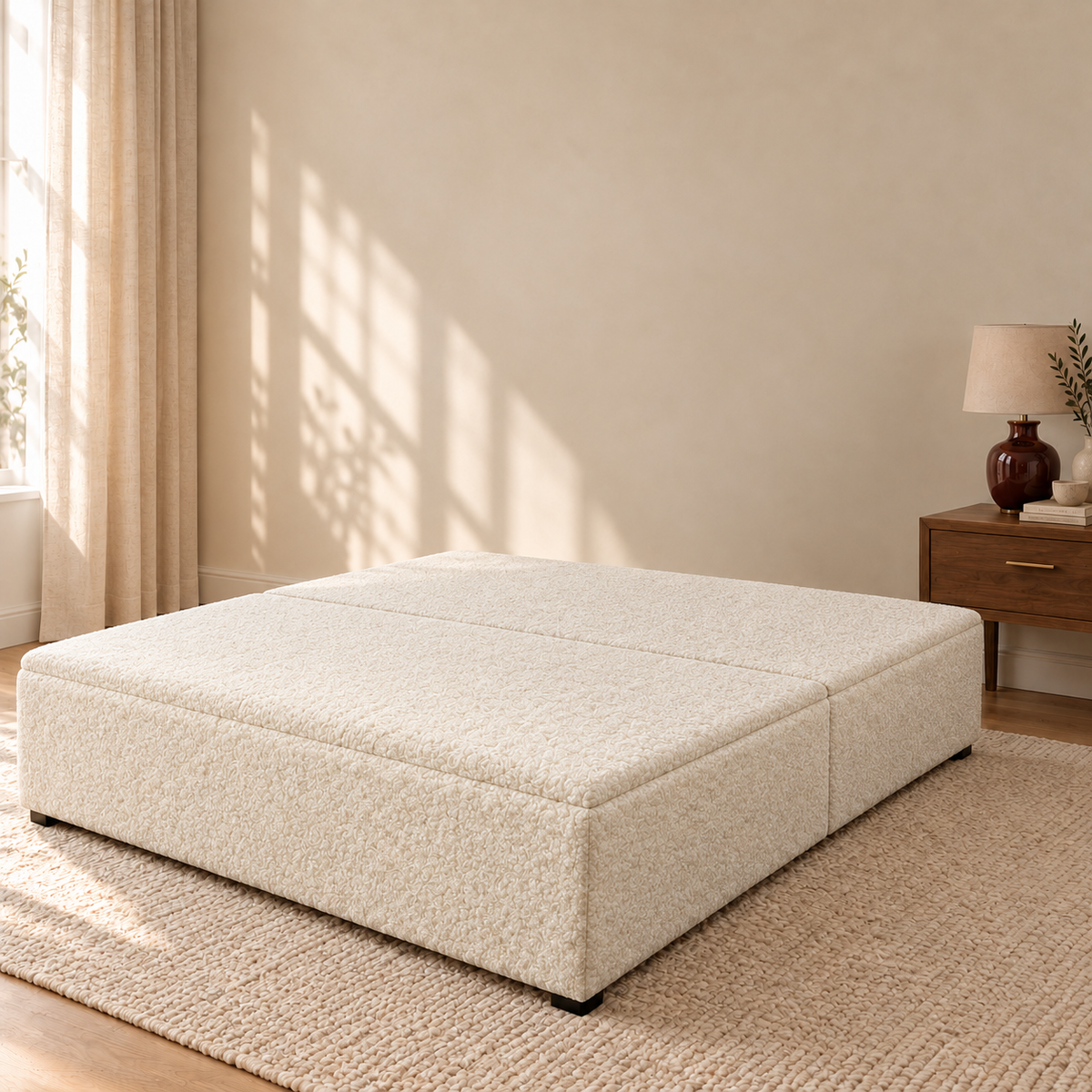Cream Teddy Bouclé ottoman storage bed base shown closed in a styled bedroom. Base only; fabric colour visualisation.
