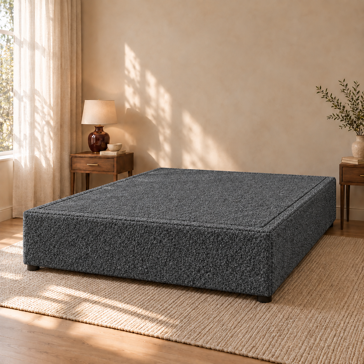 Granite Teddy Bouclé non-storage divan bed base in a styled bedroom. Base only; fabric colour visualisation.
