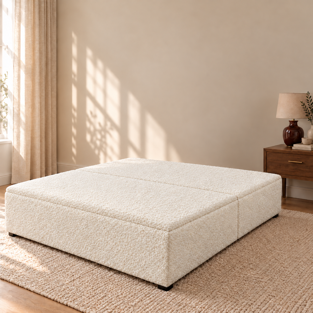 Ivory Teddy Bouclé ottoman storage bed base shown closed in a styled bedroom. Base only; fabric colour visualisation.