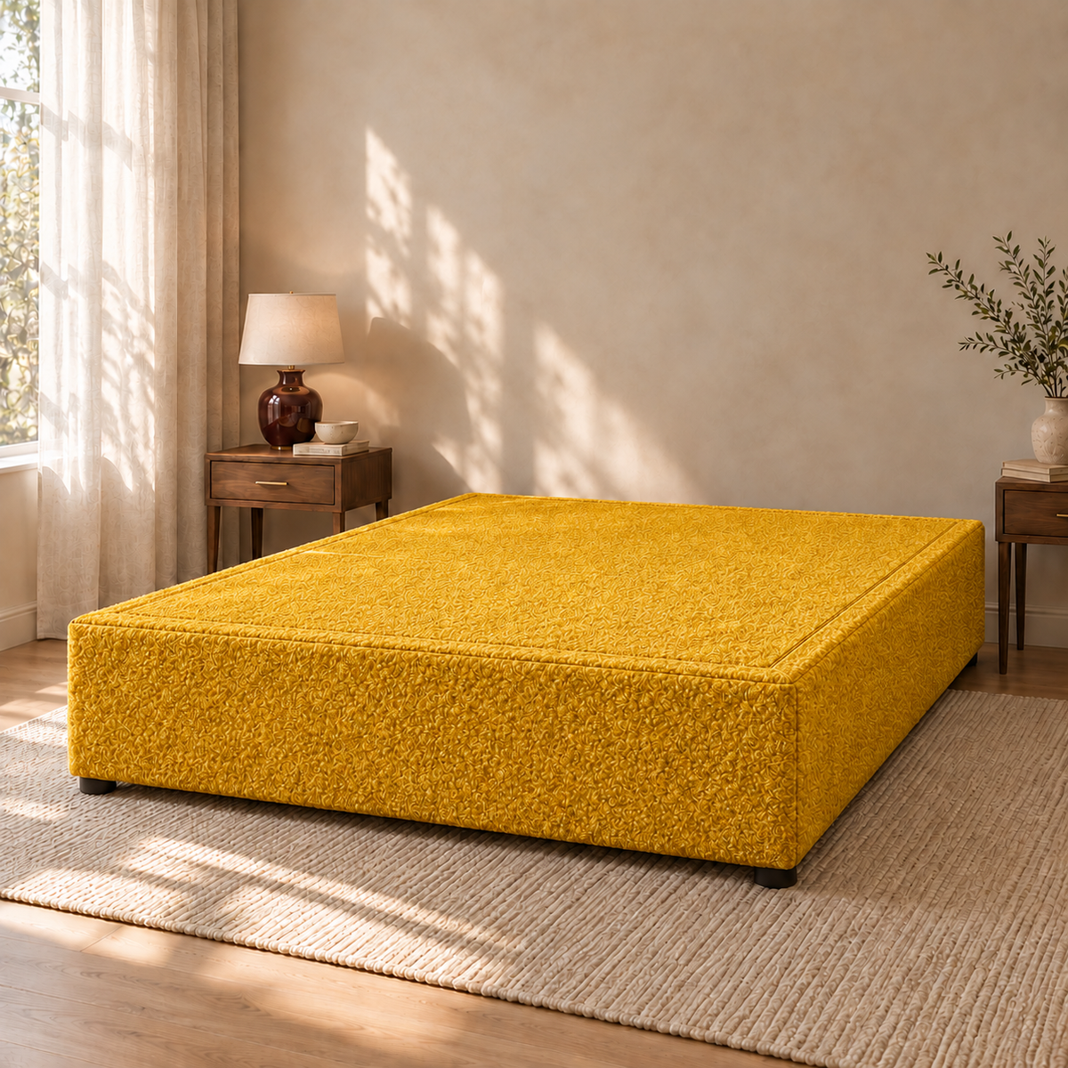 Saffron Teddy Bouclé non-storage divan bed base in a styled bedroom. Base only; fabric colour visualisation.