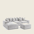 Luxury gray sectional sofa with plush cushions and matching ottoman for modern living rooms