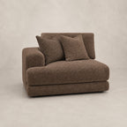 Aurelia 1 Seat One-Arm Module in Coffee on a clean stone studio background