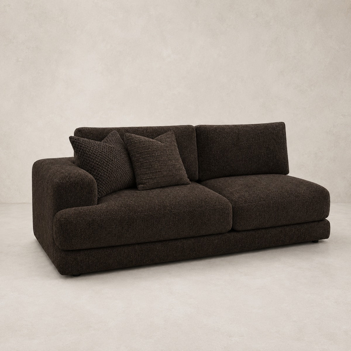 Aurelia 2 Seat One-Arm Module in Double Espresso on a clean stone studio background