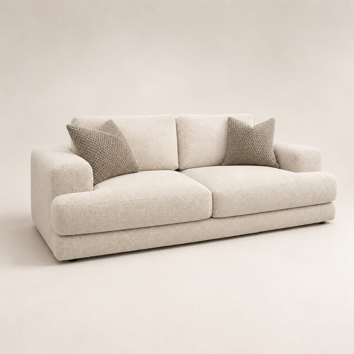 Aurelia 3 Seater Sofa in Summer Beach on a clean stone studio background