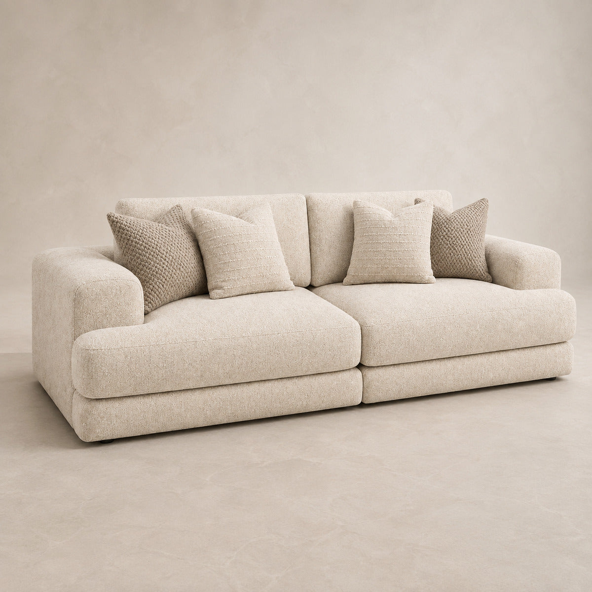 Aurelia 4 Seater Split Sofa in Summer Beach on a clean stone studio background