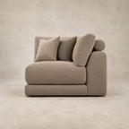 Aurelia Corner Module in Coffee on a clean stone studio background