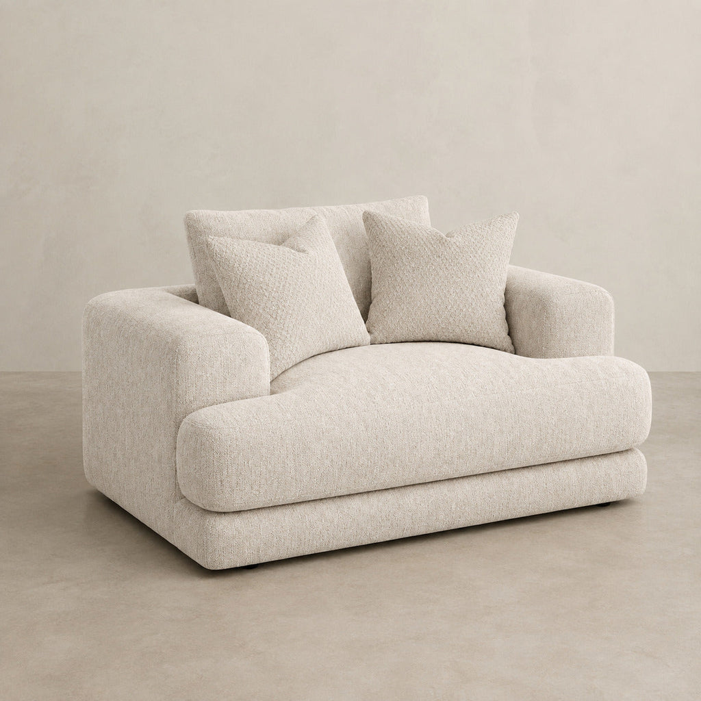 Aurelia Cuddler Love Seat in Summer Beach on a clean stone studio background