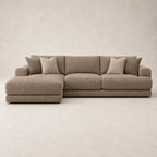 Aurelia Large Chaise Sofa in Coffee on a clean stone studio background