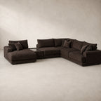 Aurelia Large Chaise Sofa & Glass-Top Table Set in Double Espresso on a clean stone studio background