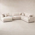 Aurelia Large Chaise Sofa & Glass-Top Table Set in Summer Beach on a clean stone studio background