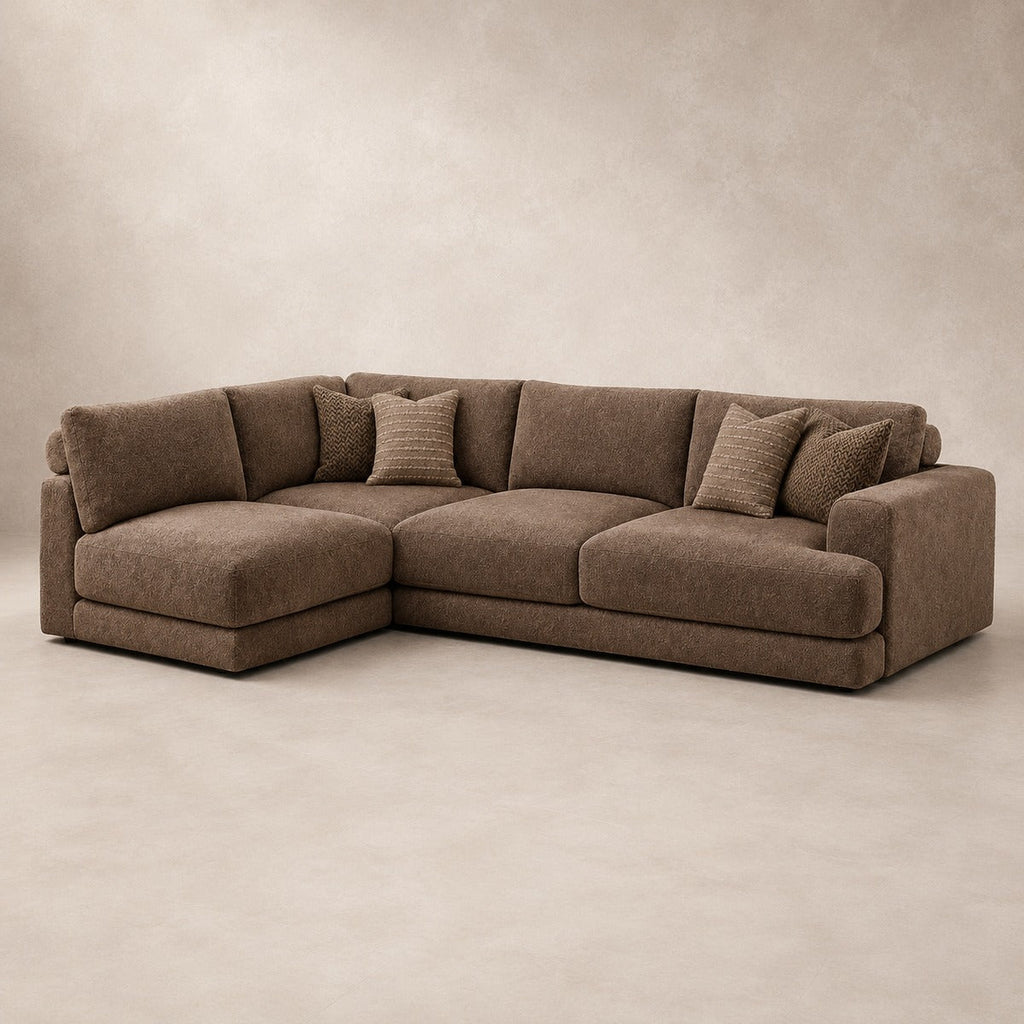 Aurelia Large Corner Sofa in Coffee on a clean stone studio background
