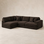 Aurelia Large Corner Sofa in Double Espresso on a clean stone studio background