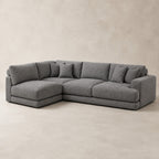 Aurelia Large Corner Sofa in Luxe Steel Grey on a clean stone studio background