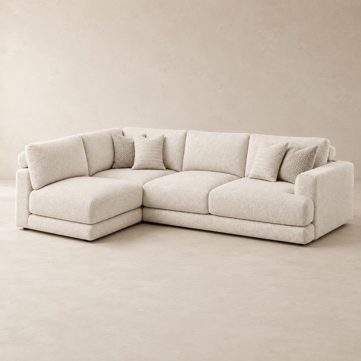 Aurelia Large Corner Sofa in Summer Beach on a clean stone studio background