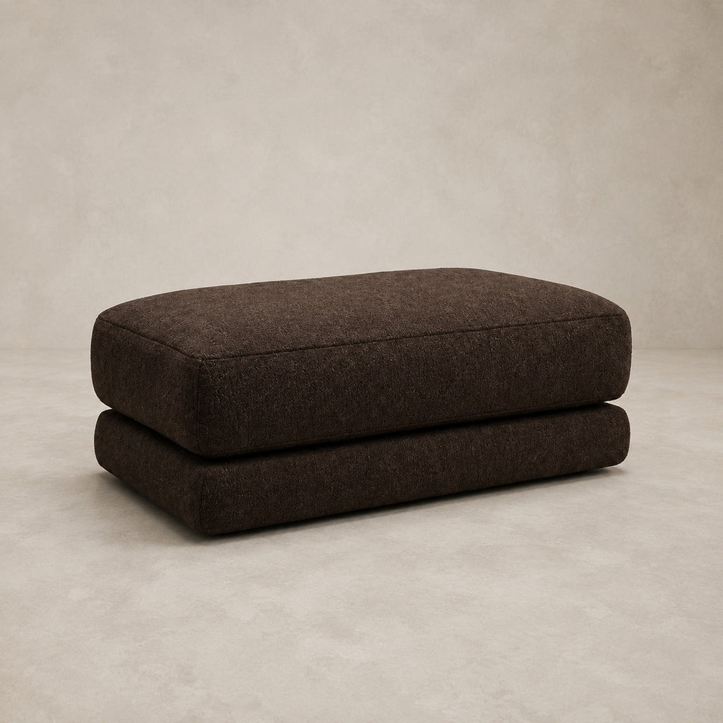 Aurelia Large Footstool in Double Espresso on a clean stone studio background