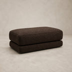Aurelia Large Footstool in Double Espresso on a clean stone studio background