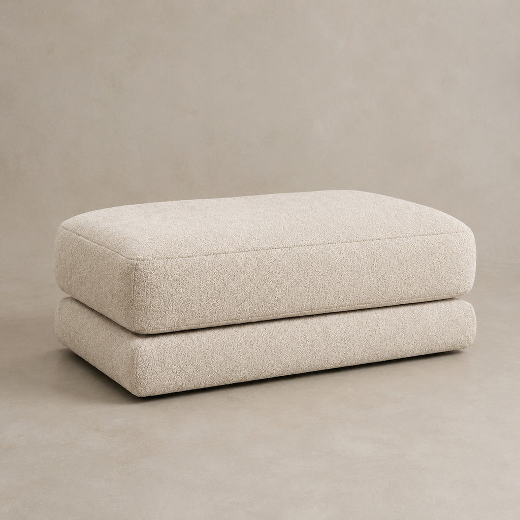 Aurelia Large Footstool in Summer Beach on a clean stone studio background