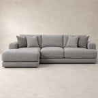 Aurelia Medium Chaise Sofa in Luxe Steel Grey on a clean stone studio background