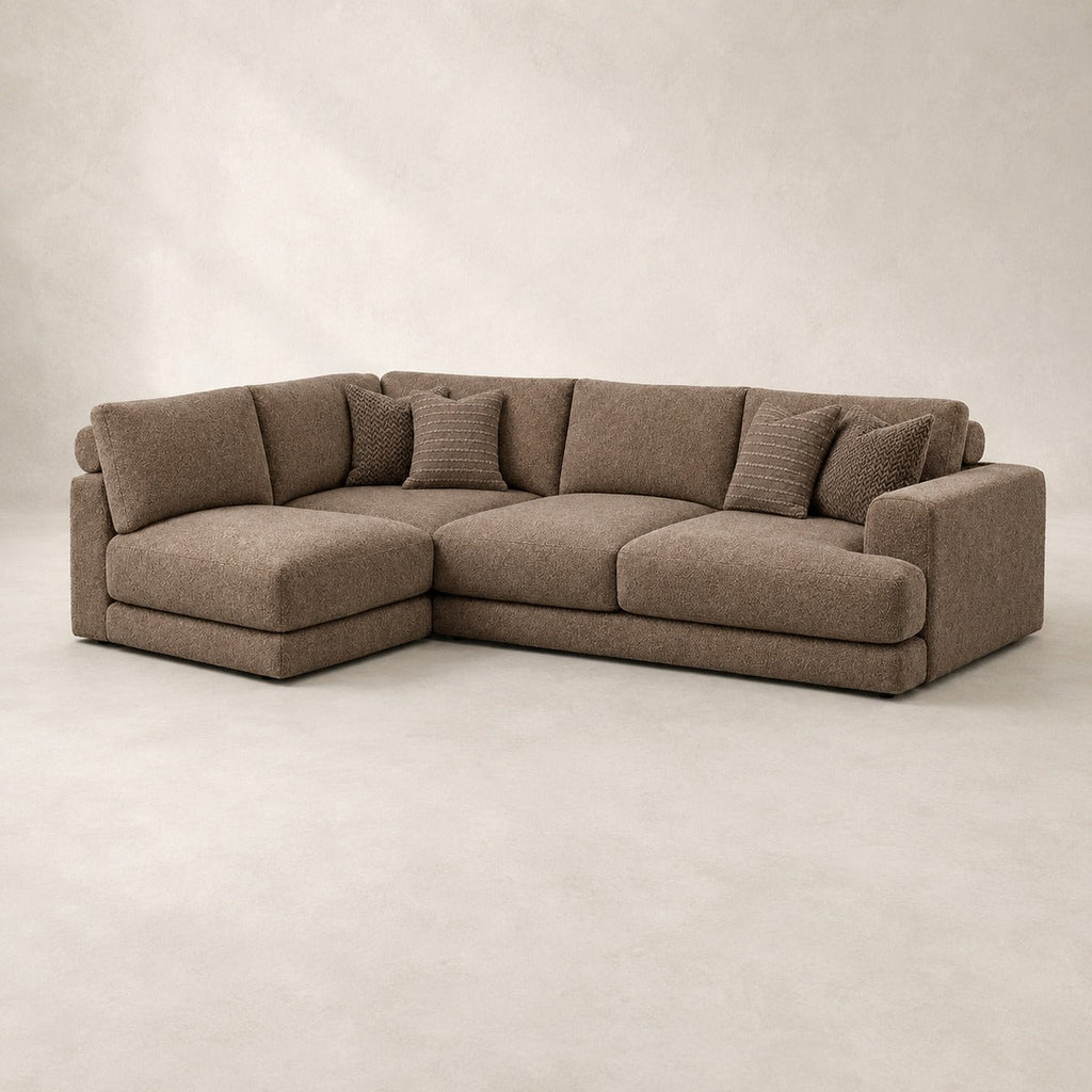 Aurelia Medium Corner Sofa in Coffee on a clean stone studio background