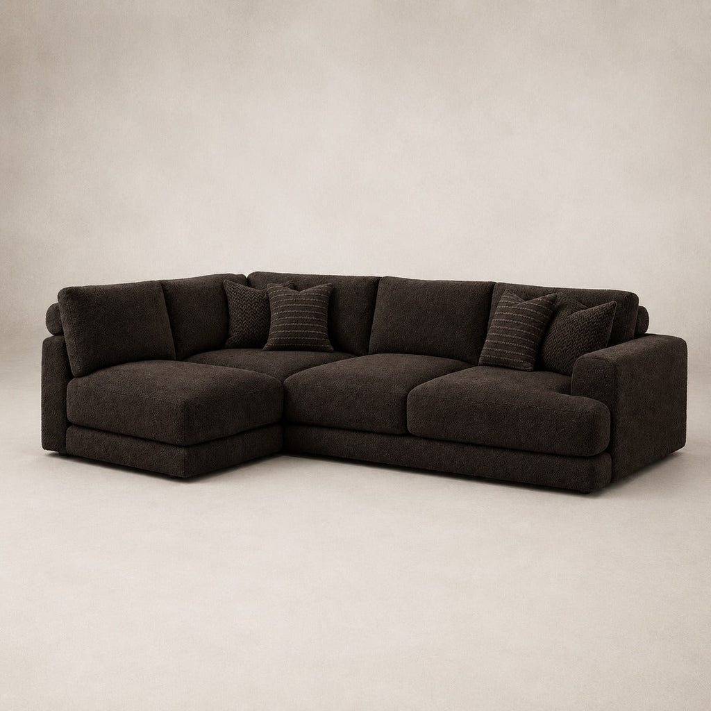 Aurelia Medium Corner Sofa in Double Espresso on a clean stone studio background