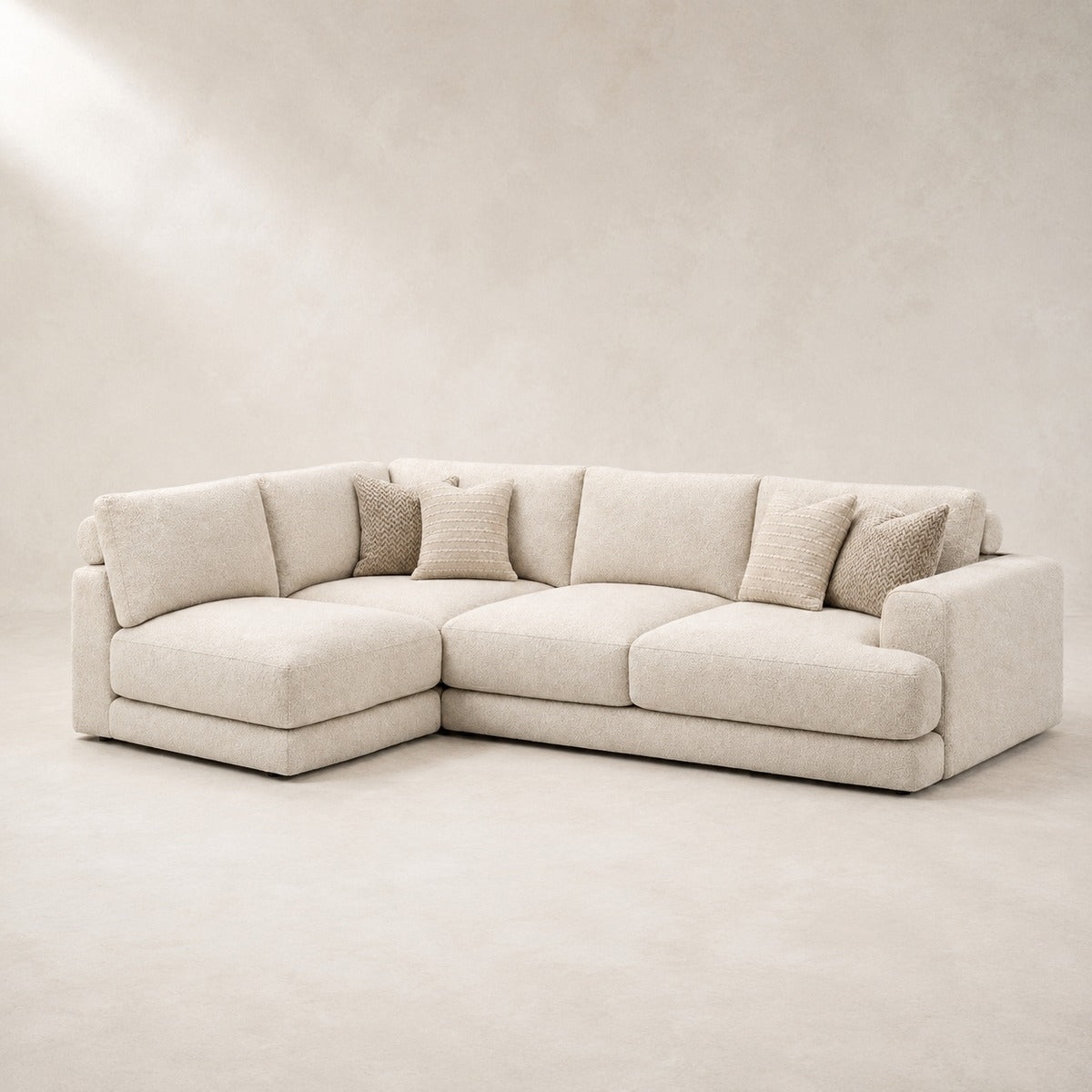 Aurelia Medium Corner Sofa in Summer Beach on a clean stone studio background